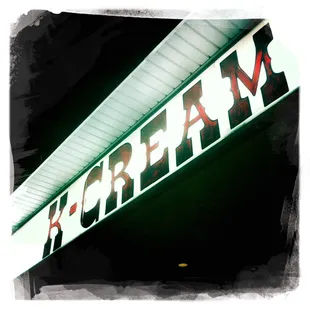 a neon sign for a restaurant