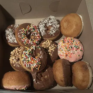 1 DOZEN SPECIALTY DONUTS (coconut chocolate glaze, strawberry w sprinkle, chocolate glaze w peanuts &amp; sprinkles, maple)