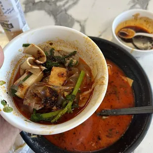 Mala Tang Bone Broth plus the extra side of chili oil. Side bowl is necessary to help the ingredients cool down a bit before eating.