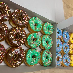 a variety of donuts in a box