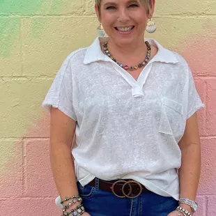 We love a white top with denim. This collard shirt is perfect for summer with its different textures.