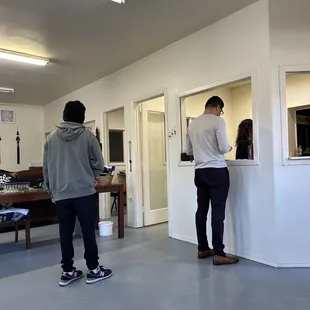 a man and a woman in a kitchen