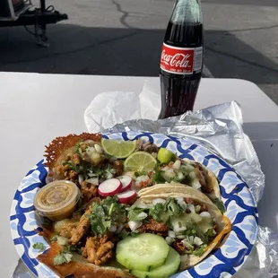 2 Regular chicken tacos and 2 El Pastor Tacodillas