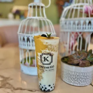 Mango Peach Slushie w/ Boba ($7.75)