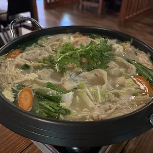 Dumpling hot pot.  Massive dumplings the size of a hockey puck.