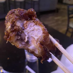 a close up of a chicken and karaoke