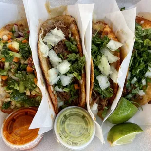 three tacos on a plate