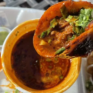 Birria taco with consommé