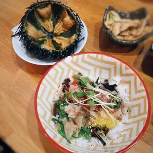 Live uni + fish roe bibimbap / $21.99
