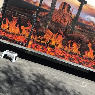 a fire scene on the side of a truck