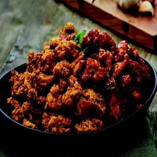 a bowl of fried chicken