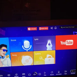 This karaoke have youtube selection in their system, you can basically look up any songs you wanted with this feature, will come back :