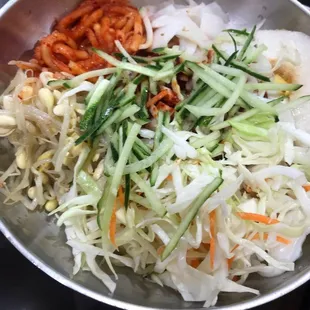 a bowl of vegetables and noodles