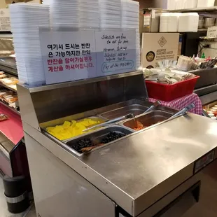 ban chan/side dish station Free when you eat-in/ extra charge for take-out. However I got a side of kimchi with my order w/out asking.