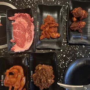 Ribeye, bulgogi chicken, pork belly, calamari, and spicy beef bulgogi