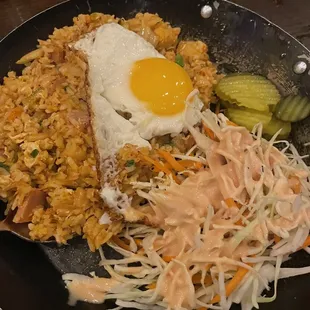 a fried egg and rice dish