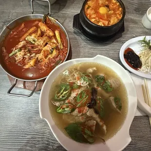 Seafood tofu soup on top, Tteokbokki in the middle, and pho special on the bottom