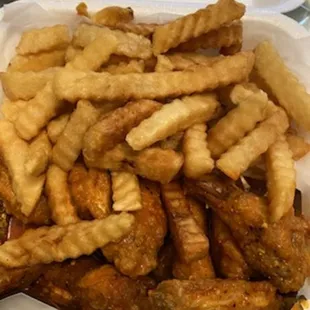 a tray of french fries and ketchup