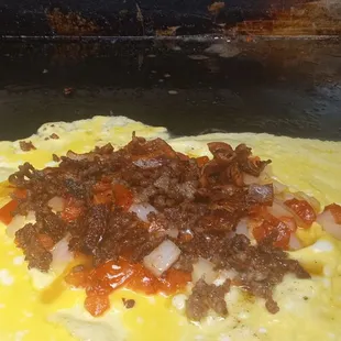 an omelet being cooked