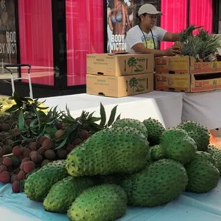 a woman selling fruit