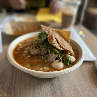 a bowl of soup on a table