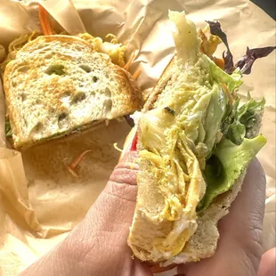 Shredded chicken sandwich (chicken coming out in the back)