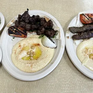 three plates of food on a table