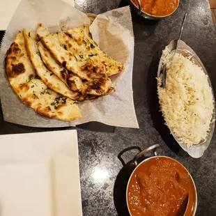 Our favorites: Chicken Curry (Gluten Free) , Lamb Vindaloo with rice and Garlic Naan