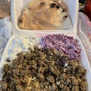 Beef Shawerma Plate with red cabbage salad, tzatziki and a side of pita bread. Delish!