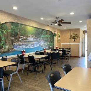 a mural of a waterfall