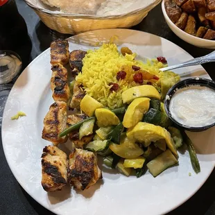 Chicken, rice and veggies (requested my chicken cooked longer), spicy potatoes