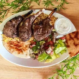 a plate of food on a wooden table