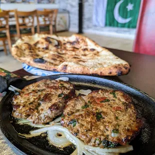 Chapli kabab ($13) and afghan naan ($4)