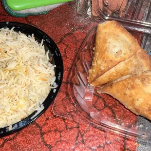 Left: rice.
 Right: vegetable samosas.