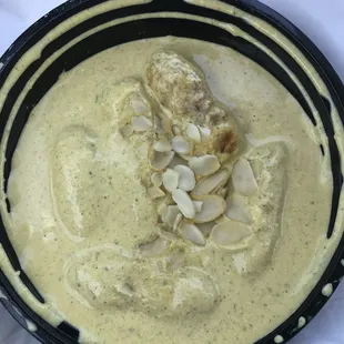 Malai Kofta, vegetarian. Great soft croquettes and ratio with flavorful sauce, instead of three jawbreaker-size balls in a sea of sauce.