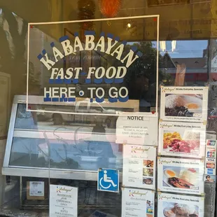 a sign in the window of a restaurant