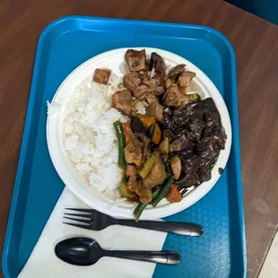 a plate of food on a tray