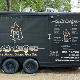 a food truck parked on the side of the road