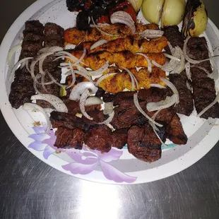 a plate of meat and vegetables