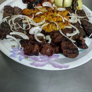 a plate of meat and vegetables