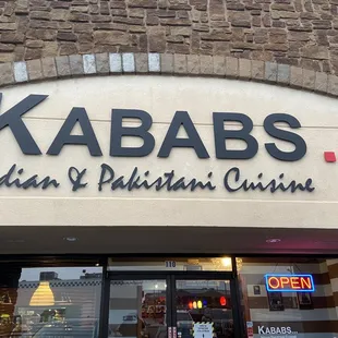 the entrance to a restaurant