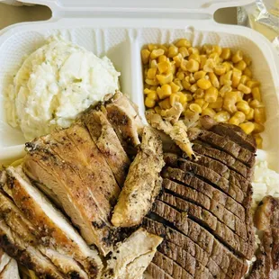 Chicken and steak, potato salad, pastas and corn.