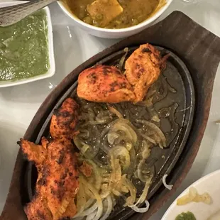 Chicken Boti (5pcs) (when i ordered delivery it didn't come with grilled onions, but when i ate in the restaurant it did!