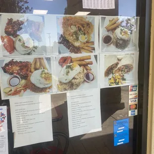 Food pics, partial menu on front window.