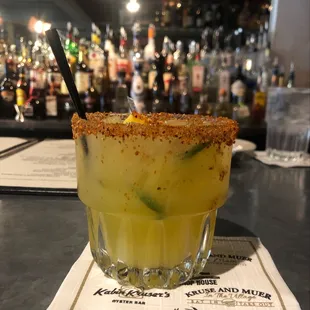 a glass of cocktail