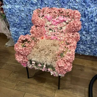 a teddy bear made out of flowers