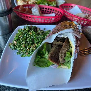 a plate of food with a fork and knife