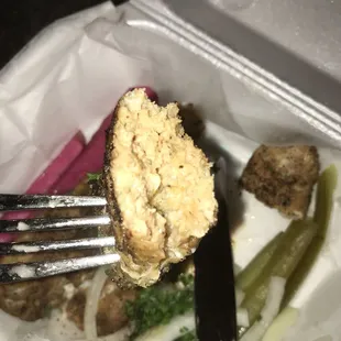 a fork with a bite taken out of it