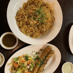 Top: Chicken Biryani: good but it&apos;s more of a pilaf and not a biryani. Bottom: Chicken Seekh Kabob: very good