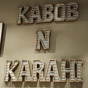 a variety of signs on a wall